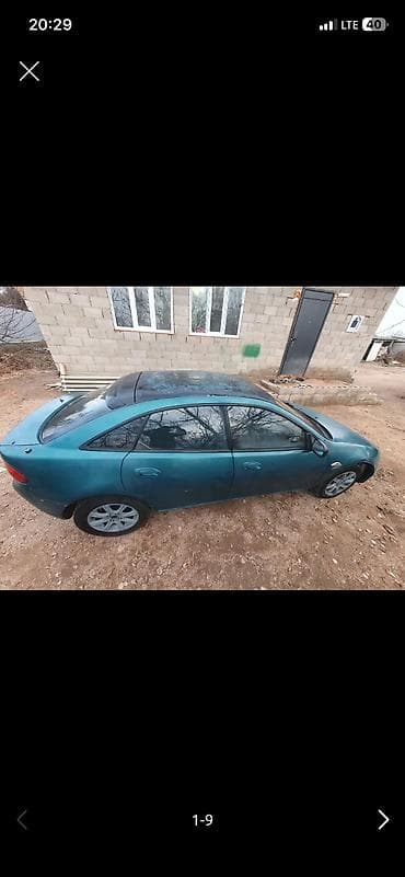 кассеты аудио: Mazda 323: 1994 г., 1.5 л, Механика, Бензин, Хэтчбэк — 6