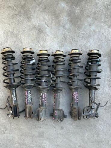 реставрация амортизаторов мотоцикла: Передний амортизатор Daihatsu Б/у, Оригинал, Япония — 1