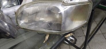escort: Передняя левая фара Ford 1993 г., Б/у, Оригинал — 1