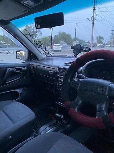 боковой тырмо: Volkswagen Polo: 1999 г., 1.6 л, Автомат, Бензин, Хэтчбэк — 10