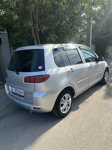 пл: Mazda Demio: 2004 г., 1.5 л, Автомат, Бензин, Универсал — 1