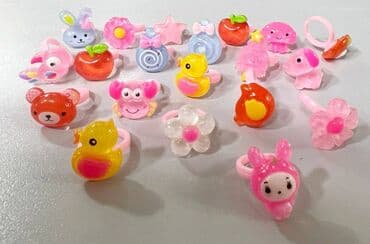 свадебное платья для беременных: Набор ярких детских колечек с забавными фигурками. На пальчиках — 3