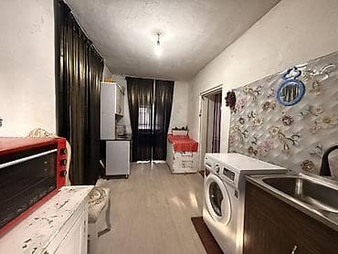 продаю дом ак ордо 1: Дом с участком и садом - Жилой дом с высоким забором и распашными — 4