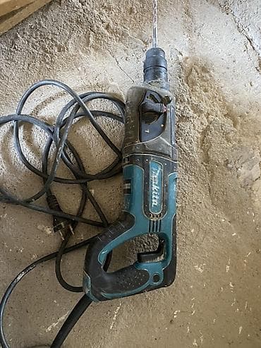 Инструменты: Перфоратор Makita HR2475 - Сеть 230–240 В, 50–60 Гц - Мощность 780 Вт — 1