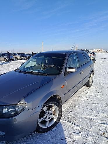 Mazda 323: 2002 г., 1.6 л, Механика, Бензин, Универсал