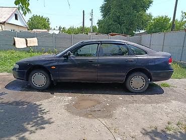 Унаа: Mazda 626: 1994 г., 1.8 л, Кол менен иштөөчү, Бензин, Лифтбек — 1