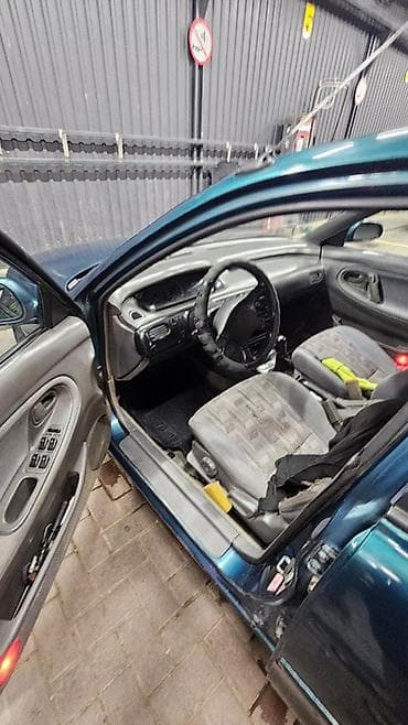 Продажа авто: Mazda 626: 1993 г., 2 л, Механика, Бензин, Хэтчбэк — 8