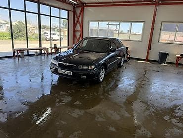 Mazda 626: 1998 г., 1.8 л, Механика, Бензин, Седан