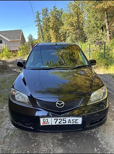 bcd com: Mazda Demio: 2003 г., 1.3 л, Автомат, Бензин, Универсал — 2