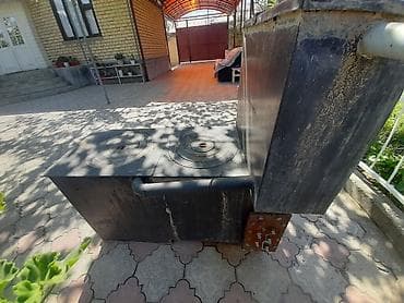 эшиктер уй: Дровяная печь-варочная с плитой Особенности: - Топочная камера — 1