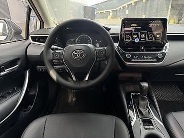 микра афтобус: Toyota Corolla: 2019 г., 1.8 л, Вариатор, Гибрид, Седан — 6