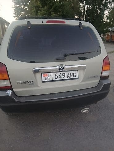 185 70 14r: Mazda Tribute: 2003 г., Автомат, Бензин, Кроссовер — 2
