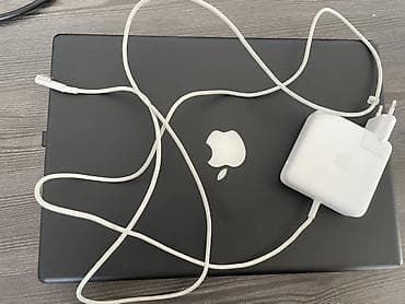Техника и электроника: Apple MacBook (черный корпус) с зарядным устройством MagSafe — 4