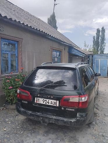 бампер тарнео: Mazda 626: 1992 г., Автомат, Универсал — 4