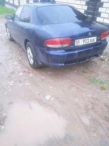 bye e5: Mazda XEDOS 6: 1994 г., 1.6 л, Механика, Бензин, Седан — 1
