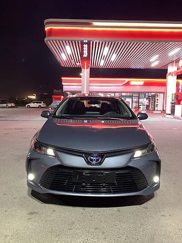 outback br: Toyota Corolla: 2020 г., 1.8 л, Вариатор, Гибрид, Седан — 2