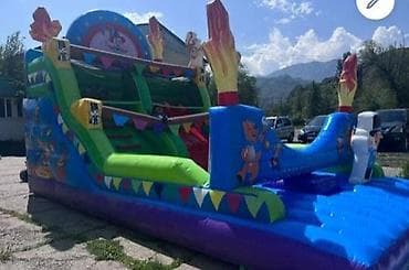 Надувной детский аттракцион «батут‑горка», почти новая - Яркая