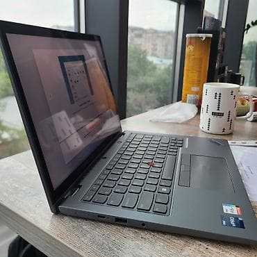 hyper x: Ноутбук Lenovo ThinkPad в корпусе серого цвета, оснащенный процессором — 4