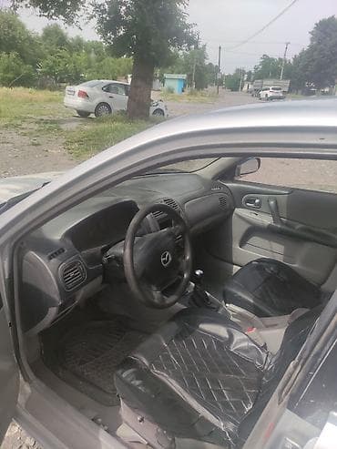 киргизские сайты авто: Mazda 323: 2002 г., 1.6 л, Механика, Бензин — 5