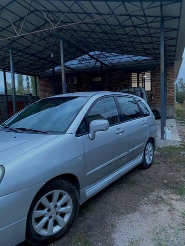 унаалар: Suzuki Liana: 2004 г., 1.6 л, Автомат, Бензин, Хетчбек — 1