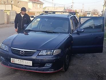 maz: Mazda 626: 2001 г., 1.8 л, Ручные, Бензин, Универсал — 4
