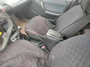 mitsubishi pojero: Mazda 323: 1994 г., Механика, Бензин — 4