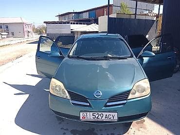 2 8: Nissan Primera: 2002 г., 2 л, Механика, Бензин, Универсал — 1