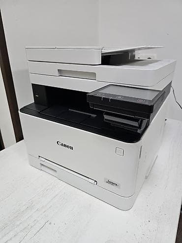 Принтеры: Продаю цветное лазерное МФУ Canon i-SENSYS MF657Cdw белого цвета Цена — 1