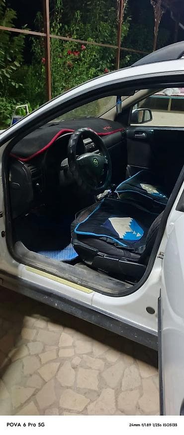 авто кроссовер: Opel Astra: 1999 г., Механика, Бензин, Универсал — 8