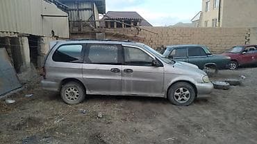 Kia Carnival: 1998 г., 2.9 л, Ручные, Дизель, Минивэн