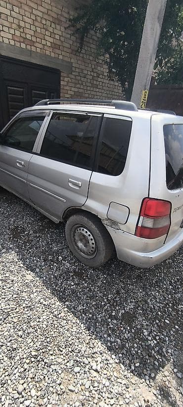 демие: Mazda Demio: 1998 г., 1.3 л, Автомат, Бензин, Универсал — 4