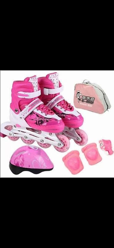 Коньки: Детский роликовый комплект в розовом цвете В комплекте: - Раздвижные — 1
