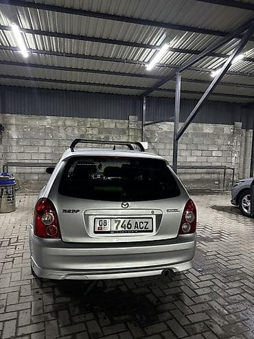 кондидер: Mazda 323: 2002 г., 2 л, Механика, Бензин, Хэтчбэк — 2
