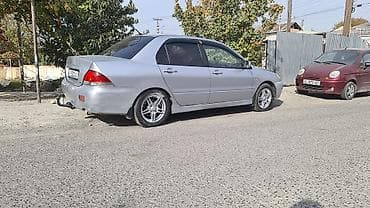 Mitsubishi Lancer: 2004 г., 1.6 л, Механика, Бензин, Седан