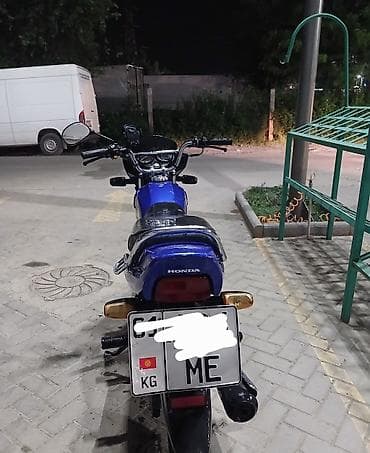 Мотоциклы: Honda Pridor — легкий городской мотоцикл синего цвета. Основные — 5