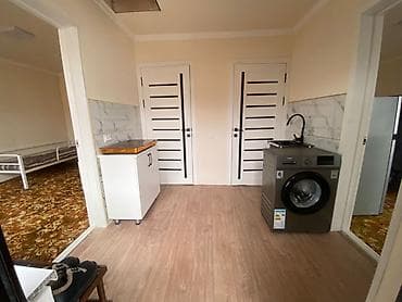 A one-room apartment is available for rent in a private residential