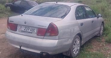 даево матиз 1: Mitsubishi Carisma: 1996 г., 1.8 л, Кол менен иштөөчү, Бензин, Седан — 4