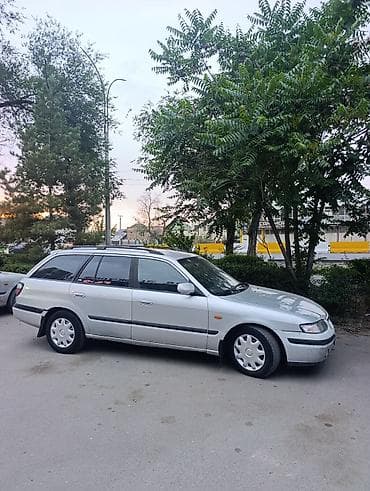 стеклопод: Mazda 626: 1998 г., 2 л, Автомат, Бензин, Универсал — 1