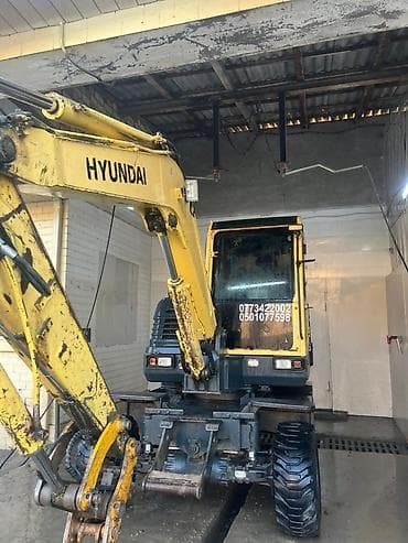 hyundai таракан: Экскаватор, Hyundai, 2011 г., Колесный — 4
