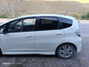 обмен дом на авто: Белый пятидверный хэтчбек Honda Jazz, идеально подходящий для — 12