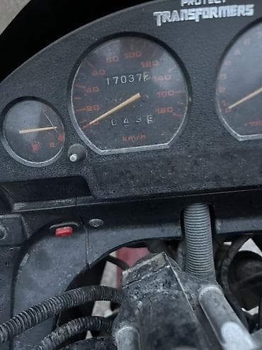 Мотоцикл Suzuki (классика 90‑х), бордовый. Характеристики и