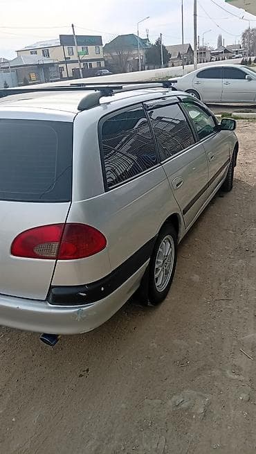 посадка машины: Toyota Avensis: 1998 г., 0.2 л, Бензин, Универсал — 1