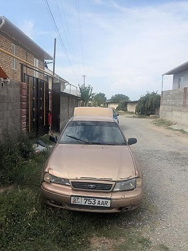 v klass: Daewoo Nexia: 2001 г., Седан — 2