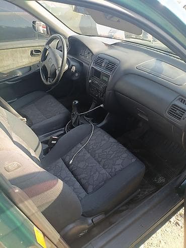 е34 540: Mazda 626: 1998 г., 0.2 л, Механика, Бензин, Хэтчбэк — 5