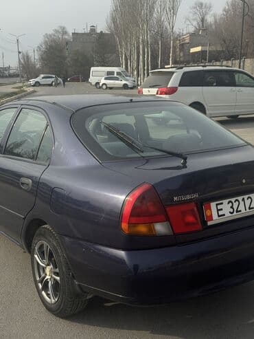 купить диски бу r15 4x100: Mitsubishi Carisma: 1996 г., 1.6 л, Автомат, Бензиновая, Седан — 4