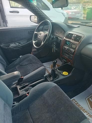 Mazda 626: 1998 г., 1.8 л, Механика, Бензин, Седан — 8