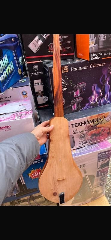 Комузы: Оруктон чабылган комуздар сатылат — 1