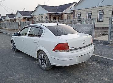 h: Opel Astra: 2011 г., 1.8 л, Автомат, Газ, Седан — 6