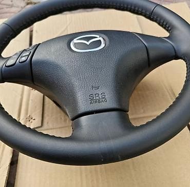 vitis taiota: Руль Mazda 2004 г., Оригинал — 1