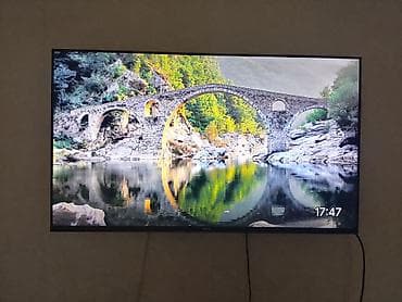 smart tv: Телевизор yasin с тонкими рамками, диагональ около 55–65". Настенное — 2